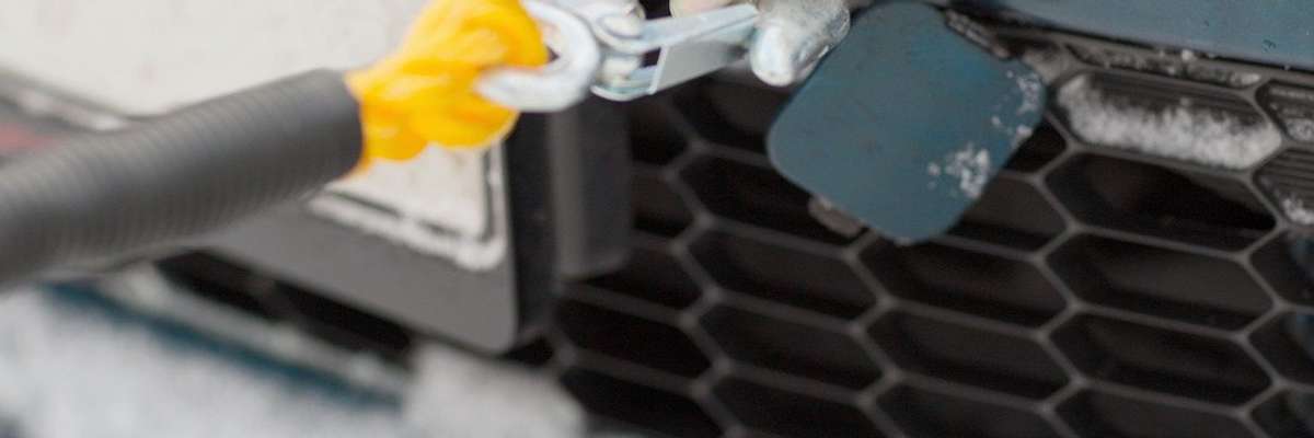 Closeup of towed car with towing rope